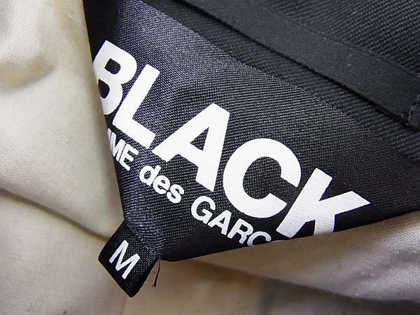 実際に弊社で買取させて頂いたBLACK COMME des GARCONS セットアップスーツ AD2011  黒 M/Lの画像 2枚目