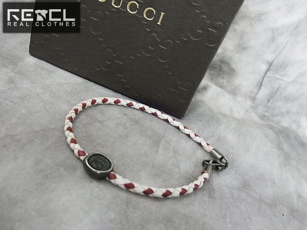 GUCCI/グッチ 刻印チャーム 編み込みレザーブレスレット 白赤の買取